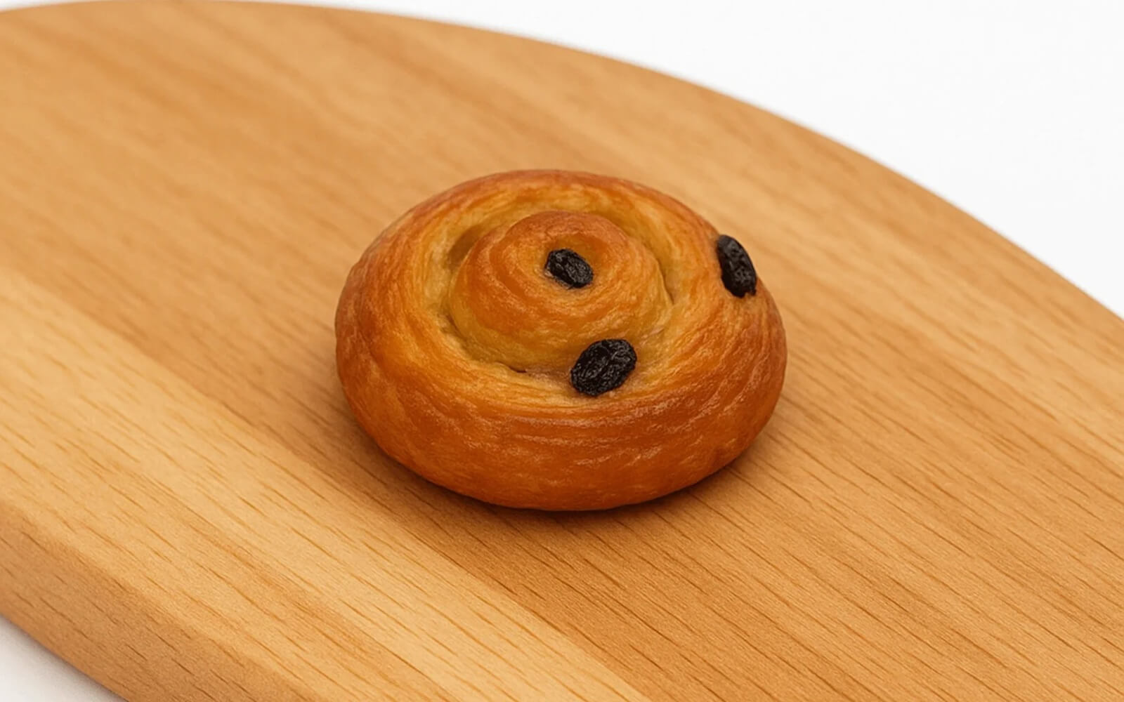 Mini polžek s kremo in rozinami